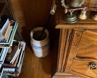 Dining Room - Crock on floor- miscellaneous on corner of China cabinet including a desk lamp & bells