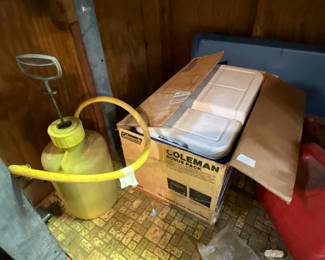 Outside storage building in back yard - Coleman ice chest bonus pack, sprayer