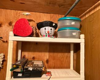 Outside storage building in back yard - Decor on top shelf