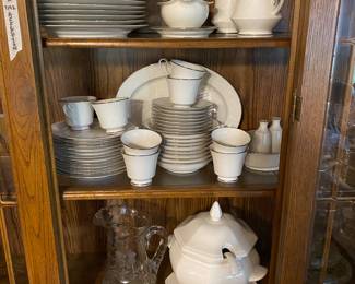Dishes in China cabinet