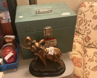 Living room - table has lots of items
