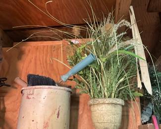 Outside storage building in back yard - Paint items in box - planter