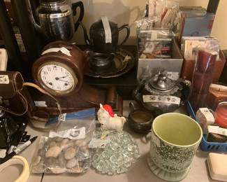 Living room - table has lots of items