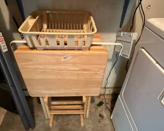 Outside laundry room with storage  - set of tv trays, dish drainer