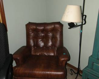 Leather chair and a one of a kind wrought iron floor lamp too