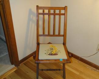 Chair. But not just any chair, a handstitched vintage chair