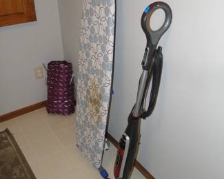 Ironing board, and floor scrubber