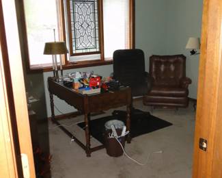 Beautiful stained glass piece, along with some den items