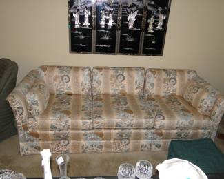 That vintage sofa, is in remarkable condition, and just look at that fabric matchup