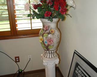 And a tall ornate vase