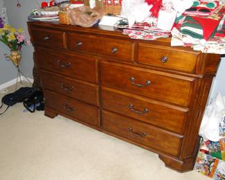 Solid wood dresser for plenty of storage, or you could use as a buffet
