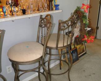 Barstools, duo, the thrice one is too the left