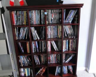 Currently holding DVD's and CD's but would make a great display cabinet, and or a great bookshelf too
