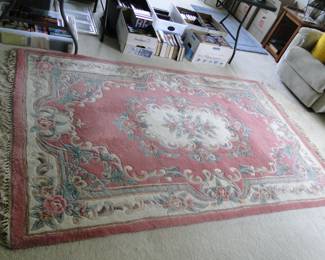 Large Salmon area rug with bright colors and in fantastic condition