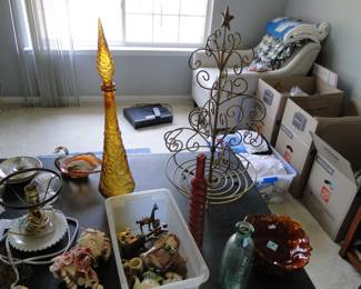 Colorful works of art, glass pieces, and toys