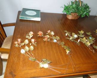 Metal and floral wall decorations