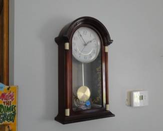 Wall mounted pendulum clock