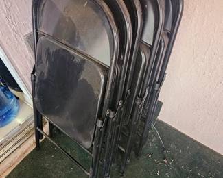 Set of nine metal folding chairs, $120