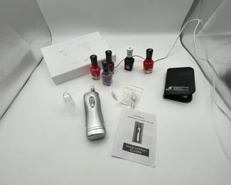 Collection of nail care, including motorized nail file and Sally Hansen Gel Polish.