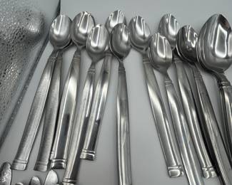 This is a beautiful Pfaltzgraff flatware set That includes: 12 table knives, 12 dinner forks, 7 salad forks, 18 teaspoons, 12 ice tea spoons, 12 soup spoons, and serving utensils. This set is a heavy weight stainless steel in good used condition. Storage chest included.
See items descriptions and photos for condition details.