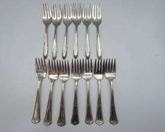 Set of silver plates dessert forks.