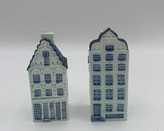 Includes a pair of silver-plated shakers (possibly 20th century), two blue glass shakers (year unknown), and two hand-painted ceramic house-shaped shakers (marked 'Hand Painted Delft' from Netherlands).