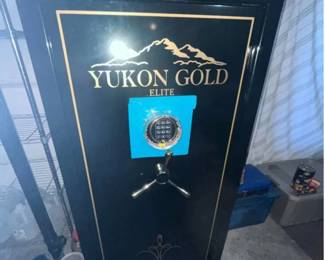 Large Gun Safe - Browning Mfg. Model: Yukon Gold Elite. Features include ample storage with interior shelving and a door organizer. Safe Measures 59" Tall x 29" Wide x 23" Deep. Great condition, see pictures for more details. Item is heavy and must be moved up from the basement level. If you need help, call Denny for an estimate on pick-up/delivery" Denny (720) 393-0204.