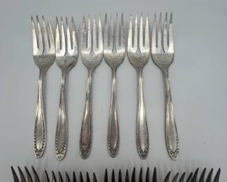 Set of silver plates dessert forks. Perfect for baby showers, bridal showers or that extra set to have on hand for parties.