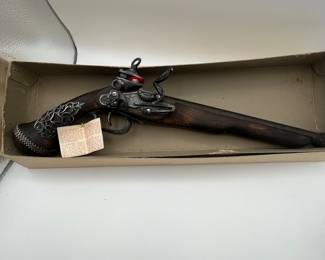 This is a fun lot that includes a collectible Flint Lock replica pistol (non operational), a Tomahawk and a model of the Mayflower. Also included is a fun stein with a sea faring scene and a little lace handkerchief. Perfect collection for the era of the founding of the United States of America.
See items descriptions and photos for condition details.