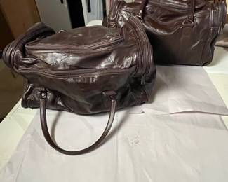 Vintage leather duffle set.