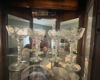 Beautiful vintage champagne saucers, etched crystal glasses.