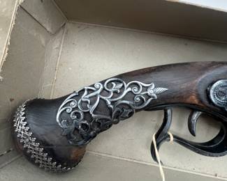 This is a fun lot that includes a collectible Flint Lock replica pistol (non operational), a Tomahawk and a model of the Mayflower. Also included is a fun stein with a sea faring scene and a little lace handkerchief. Perfect collection for the era of the founding of the United States of America.
See items descriptions and photos for condition details.