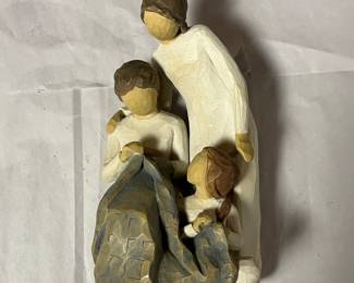 Willow Tree Figuring featuring three generations of women sewing together