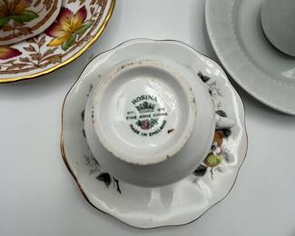 This is a beautiful lot for a tea party! A set of four white tea cups and saucers, a tea pot and three unique cups and saucers. Also included is a small crystal trinket dish.
See items descriptions and photos for condition details.