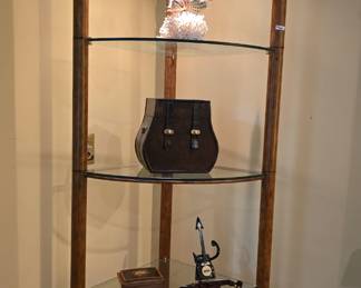 Glass & Wood lighted display cabinet with Egyptian motif.