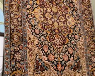 Silk 4x6 Persian Rug for $995. Hanging Rod included!