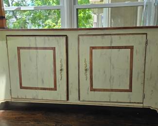 Great sideboard with folding cabinet doors.