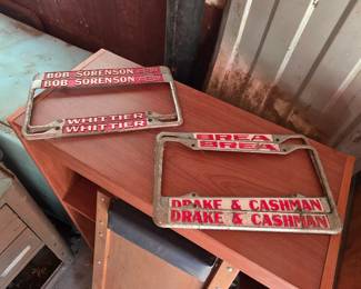 Vintage metal car dealership license plate frames
