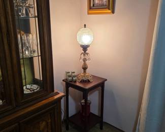 Vintage table with antique lamp