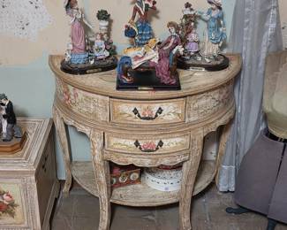 Victornia accent table with vintage figurines