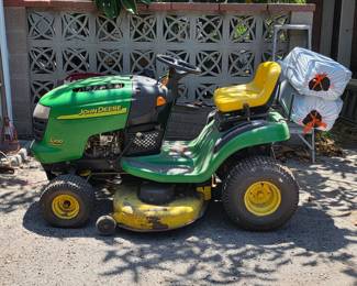 John Deere riding lawnmower