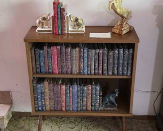 Mid century modern bookshelf and books