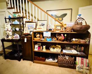 Baskets and art, bookshelf that goes with a large mantle piece with mirror