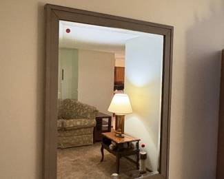 very modern colord mirror