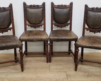4 vintage carved wood and leather chairs