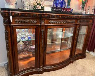 Beautiful large black marble or granite top display cabinet, $600