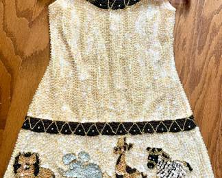 Vintage Little Girl Sequin Safari Dress by Image
Iridescent Ivory Sequined
Lions Tigers Elephants Giraffes Zebras
Size 4T