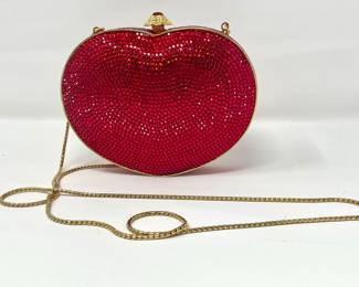 Judith Leiber Red Heart Evening Clutch with gold strap
Covered in Red Swarovski Crystals
Gold Leather inside