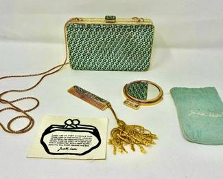 Judith Leiber Clutch & Shoulder Strap evening bag
Emerald & Clear Swarovski Crystals
Gold Leather Inside
Mirror & Comb included
By Appointment Only