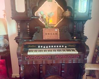 Antique 1880s pump organ with Ivory keys and stops. Piano stool and cute 70s plaster kitty !